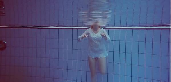  Hot babe Melisa Darkova dressed underwater